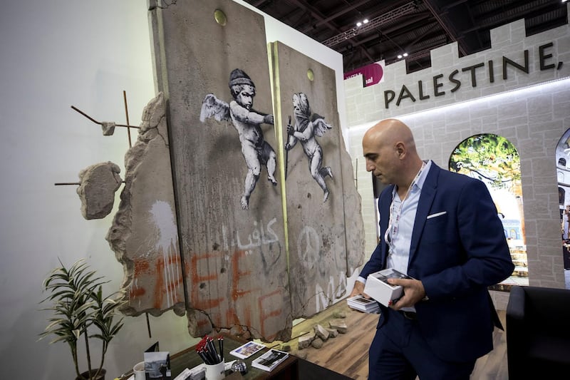 The 'replica separation barrier' created by British street artist Banksy stands. Reuters