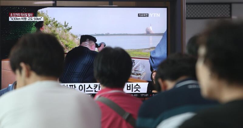 epa07738875 South Korean people watch breaking news of North Korea's missile launch, at Seoul Station in Seoul, South Korea, 25 July 2019. According to South Korea's military, North Korea on 25 July fired two short-range missiles toward the East Sea.  EPA/KIM CHUL-SOO