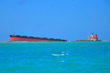 The two halves of the MV Wakashio, a bulk carrier ship that aground off the south-east coast of Mauritius, as seen from the shore. AP Photo