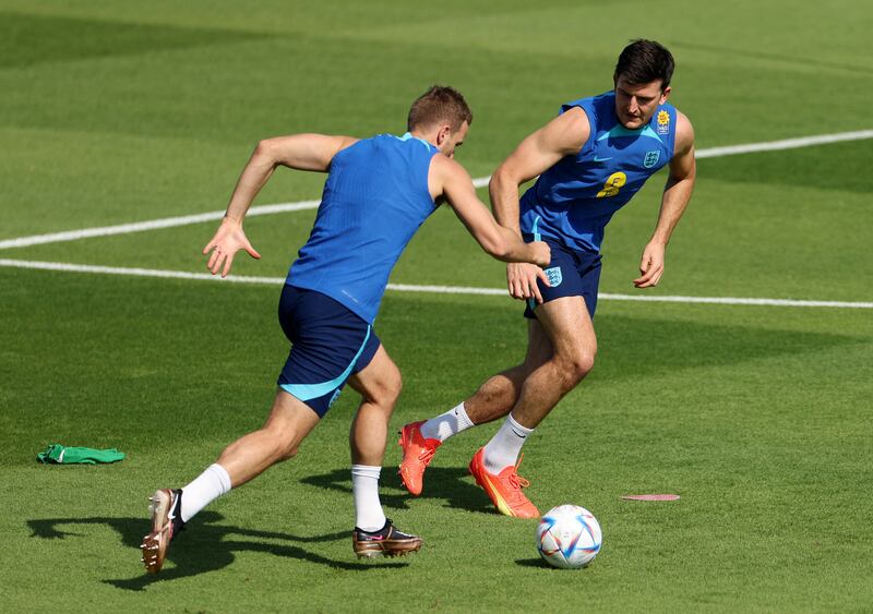 England's Harry Maguire and Harry Kane. Reuters