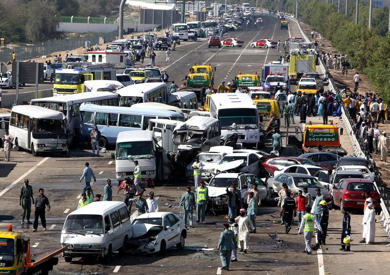 Four people were killed, 350 injured and 20 cars caught fire in a mass of tangled wreckage on the morning of March 11, 2008. Paulo Vecina / The National