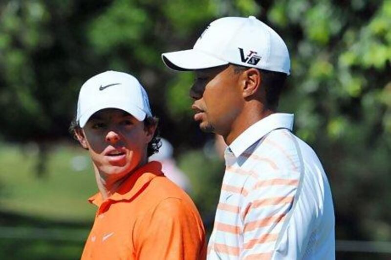Rory McIlroy, left, looked set to leave Tiger Woods in his dust until a slow start to his 2013 season, and Woods's back-to-back victories, has seen the American usurp the Northern Irishman for the world's No 1 ranking.