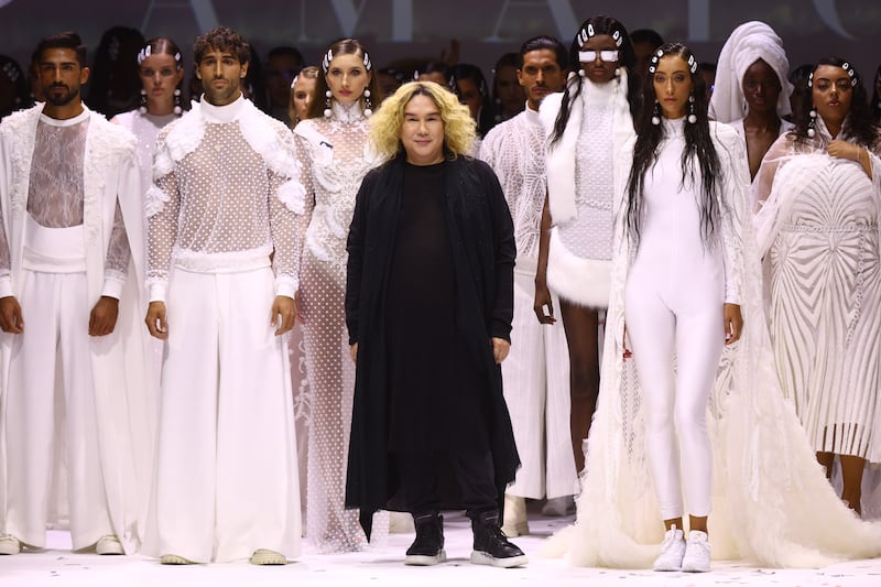 Amato designer Furne One on with models on the runway at Arab Fashion Week on March 28, 2022. Getty Images 