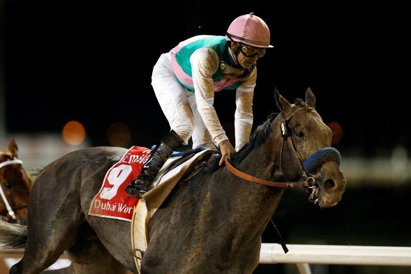 Mike Smith rides Arrogate to the finish line to win the ninth and final race of the 2017 Dubai World Cup at Meydan Racecourse in Dubai. Ahmed Jadallah / Reuters