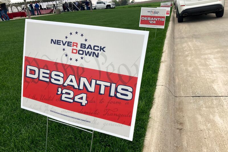 Ron DeSantis's 'Never Back Down' yard signs. AP
