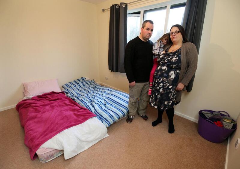 John McCann with his pregnant wife Tamsin and their daughter Orlaith, 3, who have been sleeping on a mattress on the floor at their home in Ramsgate, England, as their belongings have been held at port since June, when the family moved back from the UAE. Stephen Lock for The National
