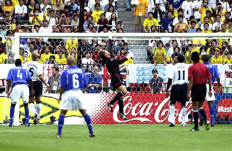 David Seaman can only look on as the ball sails over his head and into the net after a long-range shot from Brazil's Ronaldinho. This goal knocked England out at the quarter final stage of the 2002 World Cup.