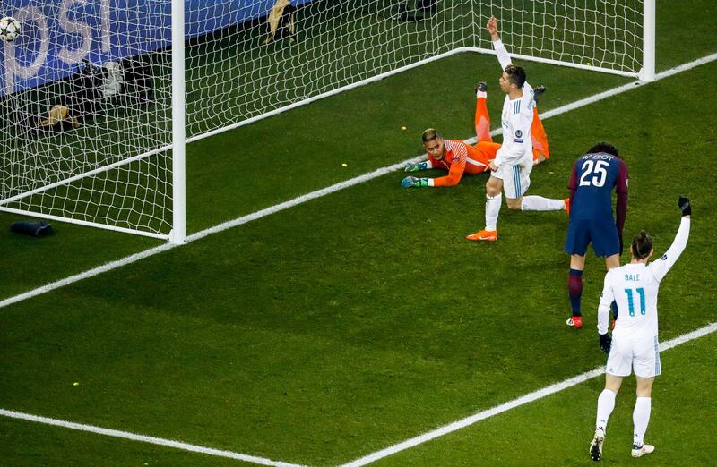 epa06585829 Real Madrid's players celebrate after teammate Casemiro scores during the UEFA Champions League round of 16 second leg soccer match between Paris Saint Germain (PSG) and Real Madrid in Paris, France, 06 March 2018.  EPA/ETIENNE LAURENT