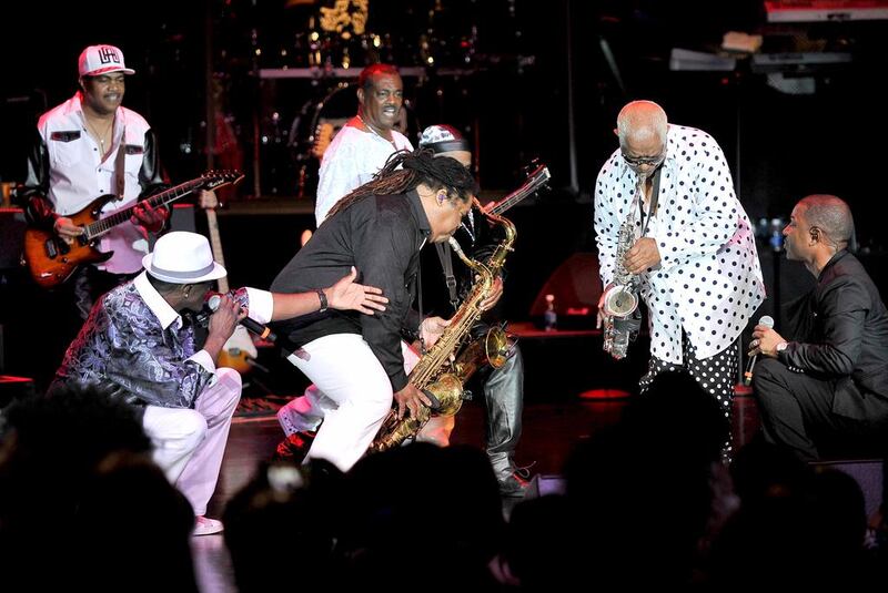 Kool & the Gang perform with Amir Bayyan, top left, and Lavell Evans, bottom left, in Las Vegas. BET / Getty Images