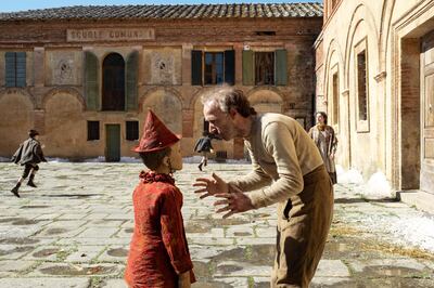 Federico Ielapi and Roberto Benigni in a scene from ‘Pinocchio’. Front Row Entertainment 