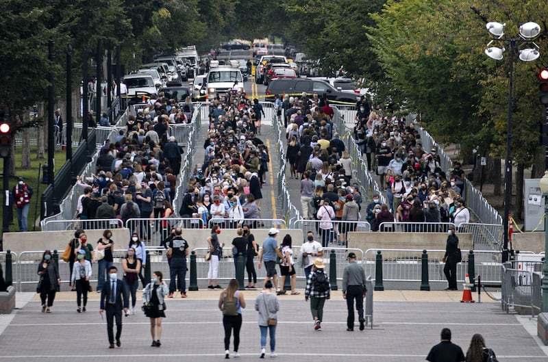 Thousands of mourners queued to pay their respects to Justice Ginsburg, a champion of women's and civil rights, at the US Supreme Court building before her casket was taken to lie in state at the US Capitol on September 25, 2020. Bloomberg