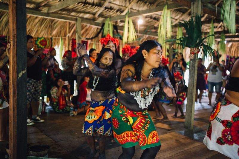 The Embera people live in Panama's forests in round-shaped homes on wooden stilts with thatched roofs. Photo: TINTA