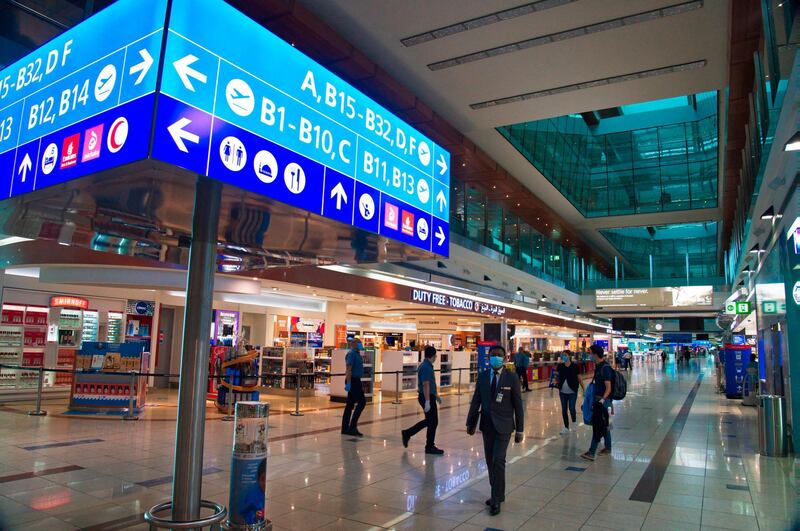 Dubai International Airport's Terminal 3, typically buzzing with passengers, stands largely empty in Dubai, United Arab Emirates, Wednesday, June 10, 2020. The coronavirus pandemic has hit global aviation hard, particularly at Dubai International Airport, the world's busiest for international travel, due to restrictions on global movement over the virus. (AP Photo/Jon Gambrell)