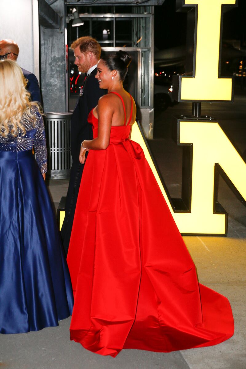 Meghan Markle stunned in a Carolina Herrera red gown. Reuters