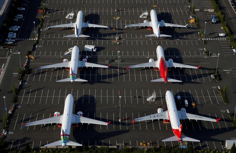 FILE PHOTO: Boeing 737 Max aircraft are parked in a parking lot at Boeing Field in this aerial photo taken over Seattle, Washington, U.S. June 11, 2020. REUTERS/Lindsey Wasson/File Photo