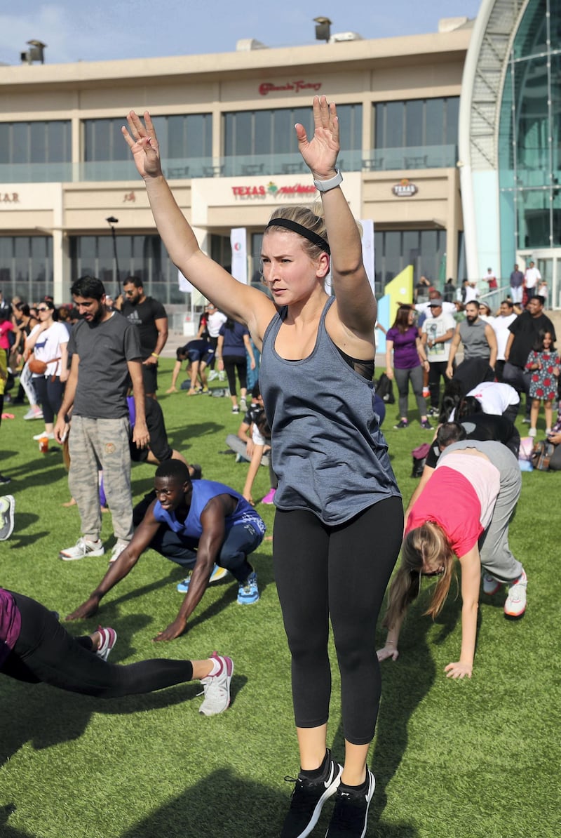 Dubai, United Arab Emirates - October 26, 2018:  HIIT Your Core workout at Dubai Fitness Challenge. The Crown Prince of Dubai renews his emirate-wide call for every resident to take part in 30 minutes of exercise for 30 days. Friday, October 26th, 2018 Festival City Mall, Dubai. Chris Whiteoak / The National