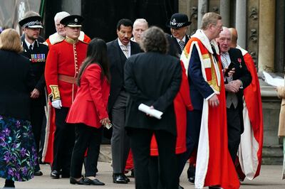 Lionel Richie, centre, wore a formal morning suit to the crowning of  King Charles III. Reuters