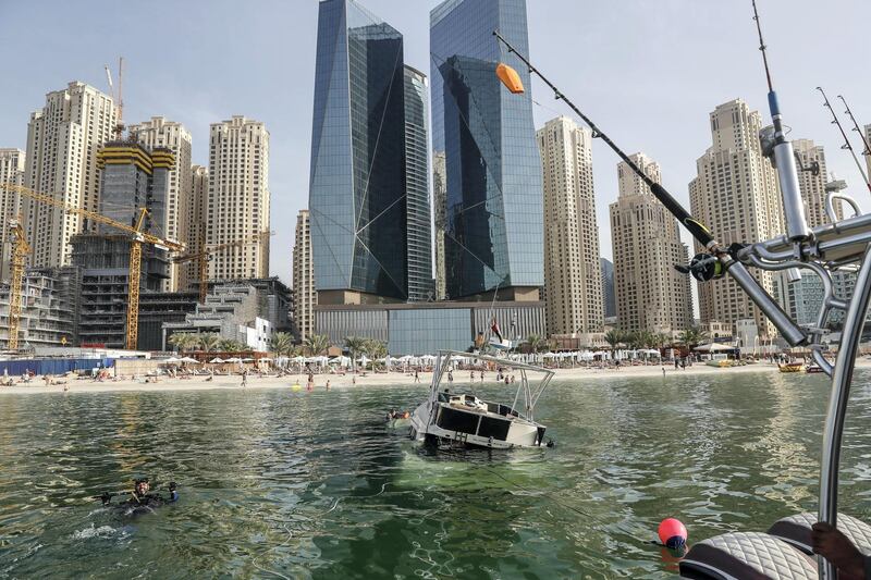 DUBAI, UNITED ARAB EMIRATES.  08 JANUARY 2019. A sunken yacht being salvaged by it’s owner Mohamed Irfan and some volunteer divers off the beach on JBR. (Photo: Antonie Robertson/The National) Journalist: None. Section: National.