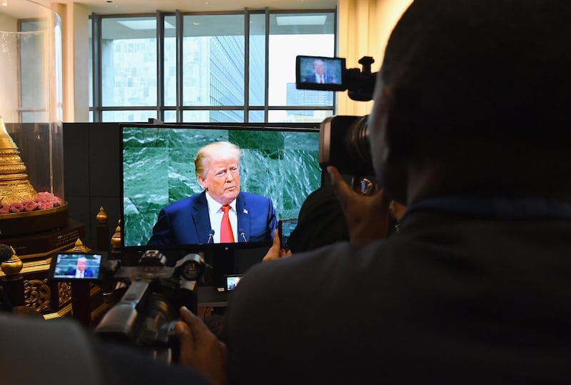 epa07046765 Members of the media inside the UN watch a television broadcasting US President Donald Trump's address  General Debate of the General Assembly of the United Nations at United Nations Headquarters in New York, New York, USA, 25 September 2018. The General Debate of the 73rd session begins on 25 September 2018.  EPA/ANGELA WEISS