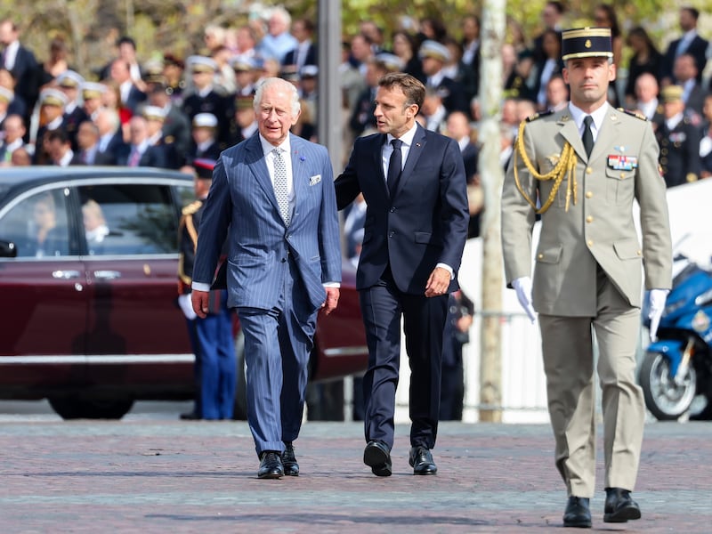 King Charles and Mr Macron during a ceremonial welcome at the Arc De Triomphe. Getty Images
