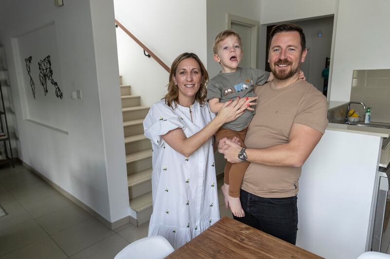 Paul Willetts with his wife Amy and their son Jesse, three, at their home in Town Square. All photos: 
Antonie Robertson / The National