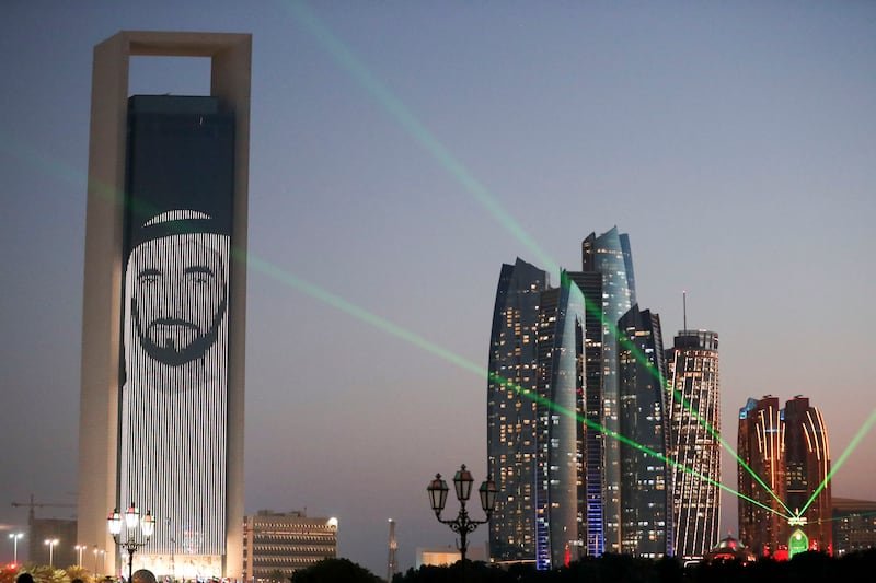 ADNOC lit up with different images of the leaders to mark the year of the Golden Jubilee occasion, in Abu Dhabi. Khushnum Bhandari/The National