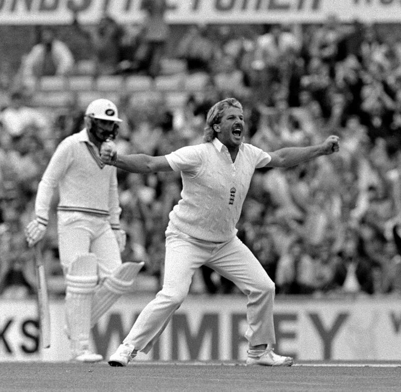 A triumphant return to test cricket for England all-rounder Ian Botham, as he raises his arms after dismissing New Zealand's Jeff Crowe to become the highest wicket taker in test history with 356 victims.   (Photo by PA Images via Getty Images)