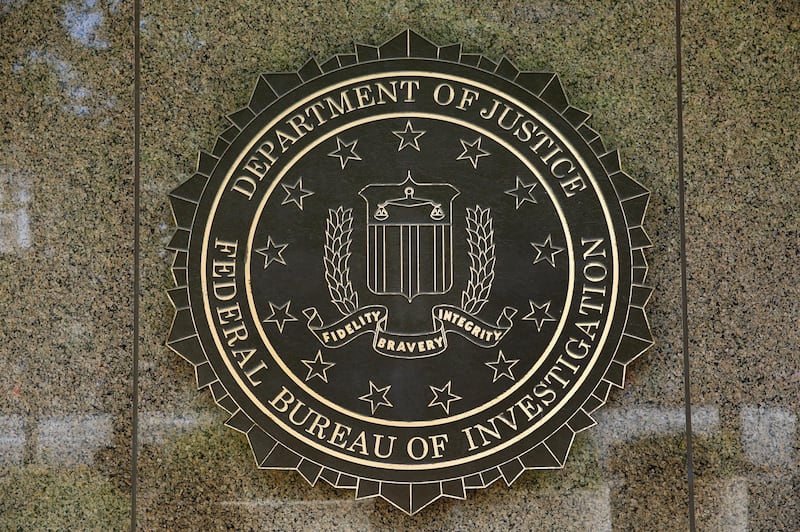 The FBI seal is seen outside the headquarters building in Washington, DC on July 5, 2016. - The FBI said Tuesday it will not recommend charges over Hillary Clinton's use of a private email server as secretary of state, but said she had been "extremely careless" in her handling of top secret data. The decision not to recommend prosecution will come as a huge relief for the presumptive Democratic nominee whose White House campaign has been dogged by the months-long probe. (Photo by YURI GRIPAS / AFP)