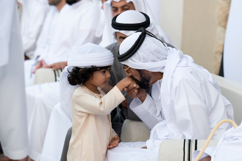 Sheikh Tahnoun bin Mohamed, Ruler's Representative in Al Ain Region, greets Sheikh Mohamed bin Khalifa bin Tahnoun during the group wedding.