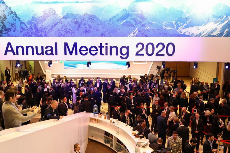Attendees wait outside the main Congress Hall ahead of the special address by U.S. President Donald Trump, on the opening day of the World Economic Forum (WEF) in Davos. Bloomberg