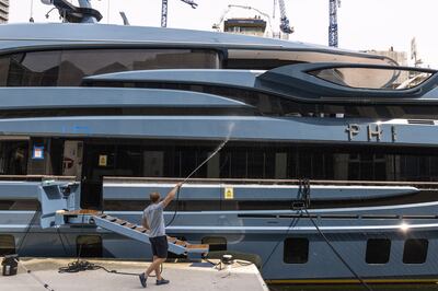 Locals say they see staff maintaining the superyacht in the Docklands area of London: Photo: Getty Images 
