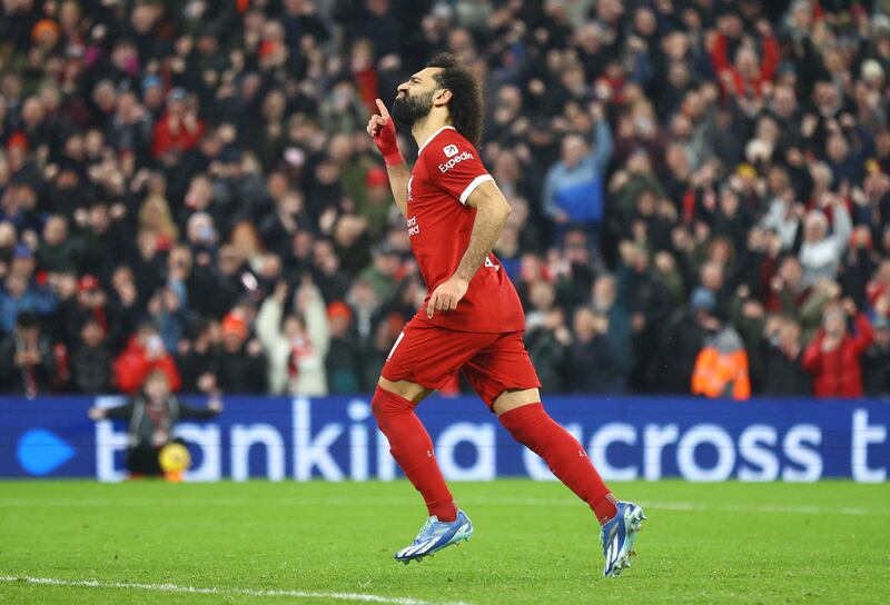Mohamed Salah celebrates scoring Liverpool's fourth goal from the penalty spot. Reuters