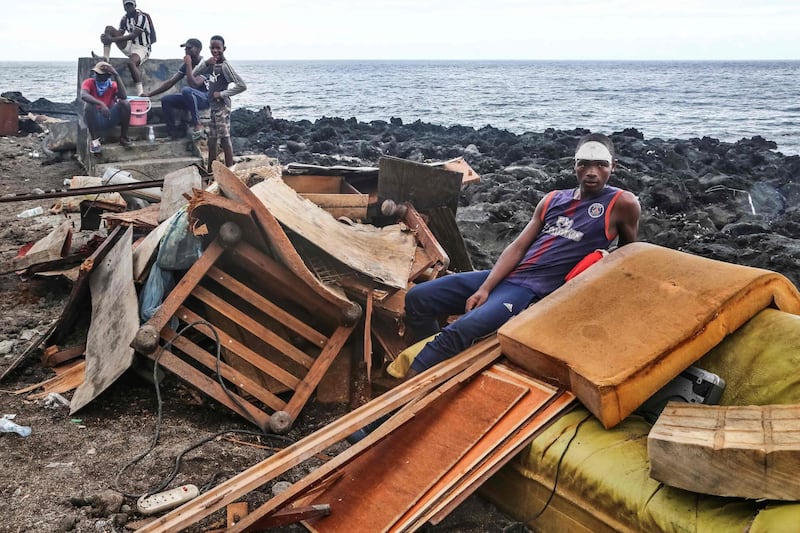 Stranded residents are seen on April 27, 2019 in Fumbuni, 56km south of Comoros capital Moroni, following the passage of the cyclone Kenneth. Thousands of people in remote areas of storm-lashed Mozambique were homeless Saturday and bracing for imminent flooding, food and water shortages as Cyclone Kenneth flattened entire villages, leaving rescuers struggling to reach them.
 AFP