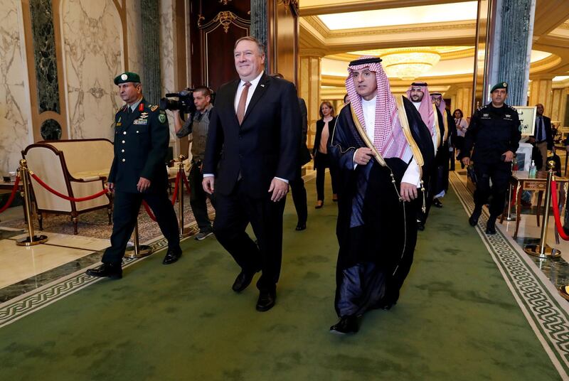 Mike Pompeo walks with Saudi Foreign Minister Adel Al Jubeir. Reuters