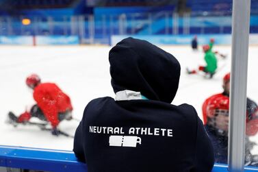 Beijing 2022 Winter Paralympic Games - Para Ice Hockey - Training - National Indoor Stadium, Beijing, China - March 3, 2022.  A team member of the team formerly known as the Russian Paralympic Committee displays the words 'neutral athlete' with a piece of tape covering the word Russia on their clothing during training REUTERS / Peter Cziborra