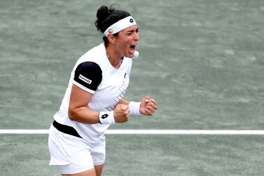 CHARLESTON, SOUTH CAROLINA - APRIL 09: Ons Jabeur of Tunisia celebrates her win against Amanda Anismova during the semifinals of the Credit One Charleston Open at Credit One Stadium on April 09, 2022 in Charleston, South Carolina.    Matthew Stockman / Getty Images / AFP
