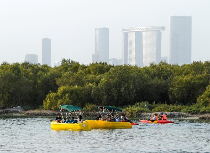 Abu Dhabi, United Arab Emirates, March 12, 2021. Visitors enjoy their Friday afternoon at the Anantara Eastern Mangroves with their rented Kayaks, Donut Boats, and other exciting floatation vehicles.
Victor Besa / The National
Section:  NA
FOR:  Stand alone/Big Picture