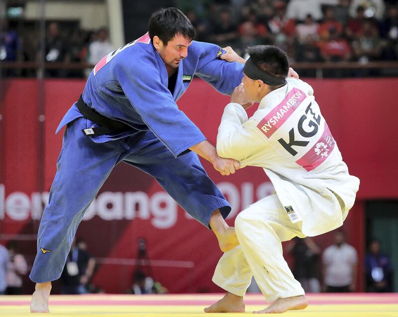 Victor Scvortov (blue) on his way to win the judo bronze medal from Bettor Rysmambetov of Kyrgyzstan in the 73-kilogram weight in the 18th Asian Games at the Jakarta Convention Centre on Thursday, August 30, 2018. Courtesy UAENOC.
