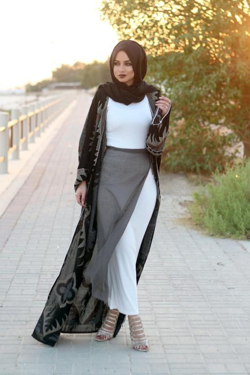Soha Taha, a 26-year-old Egyptian fashion blogger from Al Ain. Below, models walk the runway for designer Anniesa Hasibuan at New York Fashion Week. Courtesy Soha Taha;