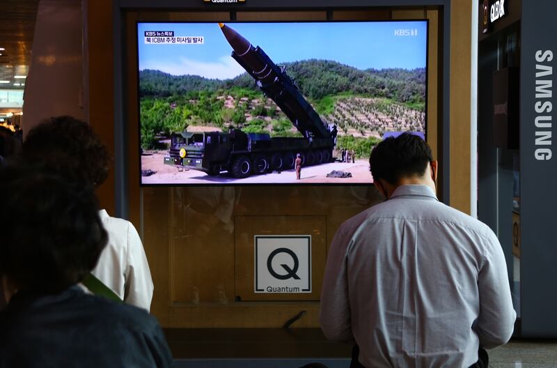 South Koreans watch a North Korean missile launch. Seoul says Pyongyang fired three ballistic missiles towards the East Sea. EPA