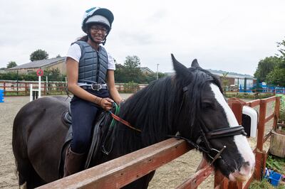 Aamilah Aswat, 15, first learnt to ride at the St James City Farm and Riding School and is part of the Khadijah Mellah scholarship, supporting eight riders around the country. Mark Chilvers / The National
