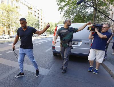 BERLIN, GERMANY - AUGUST 17: Nasser Abou-Chaker (C), brother of Arafat Abou-Chaker (L) who was a former manager of Bushida, leave the Berlin district court without providing a brief to press, after the trial against a former business partner of Plaintiff Anis Mohamed Youssef Ferchichi, known as German rapper Bushido, in Berlin, Germany on August 17, 2020. Bushido is brought to the court from the back door under the control od the police officers. (Photo by Abdulhamid Hosbas/Anadolu Agency via Getty Images)