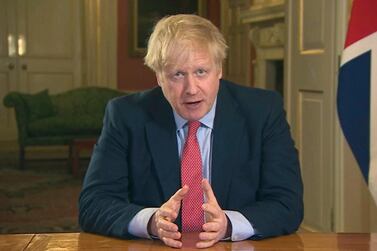  Britain's Prime Minister Boris Johnson addresses the nation from 10 Downing Street, in London, Monday March 23, 2020. UK Pool via AP
