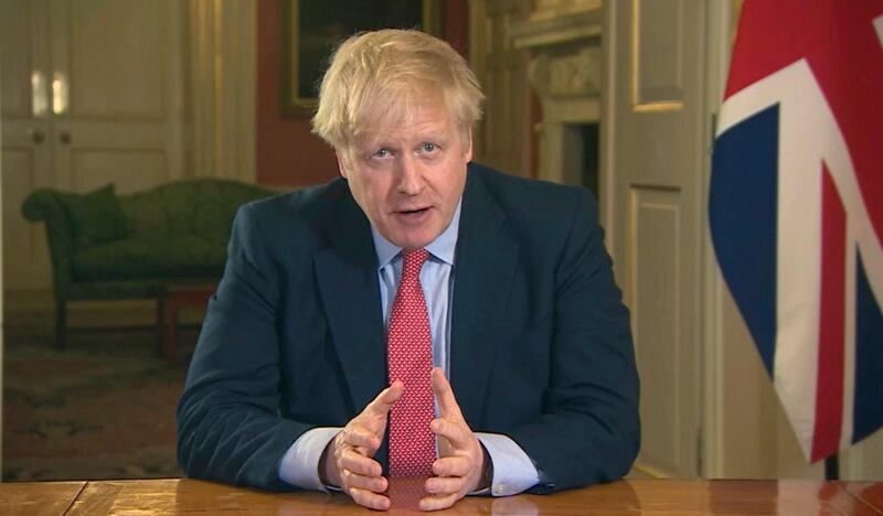 In this screen grab taken from video, Britain's Prime Minister Boris Johnson addresses the nation from 10 Downing Street, in London, Monday March 23, 2020. Johnson has ordered the closure of most retail stores and banned gatherings for three in a stepped-up response to slow the new coronavirus. The measures Johnson announced in an address to the nation on Monday night a mark a departure from the British government's until-now more relaxed approach to the worldwide COVID-19 pandemic. (UK Pool via AP)