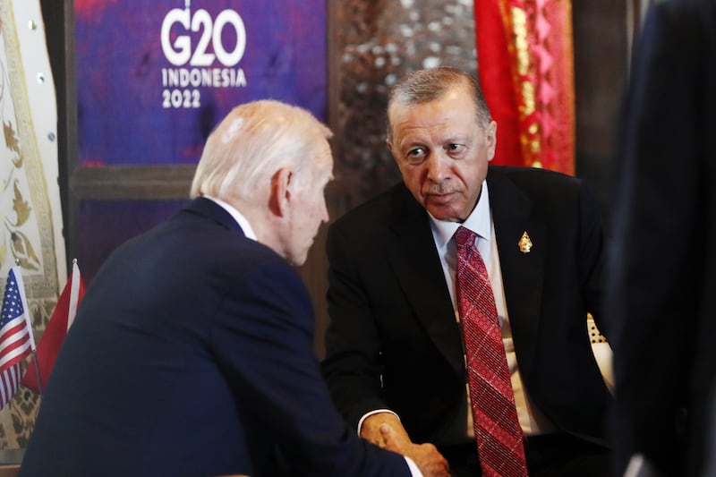 US President Joe Biden speaks with Turkish President Recep Tayyip Erdogan during the G20 leaders' summit in Bali, Indonesia. AP