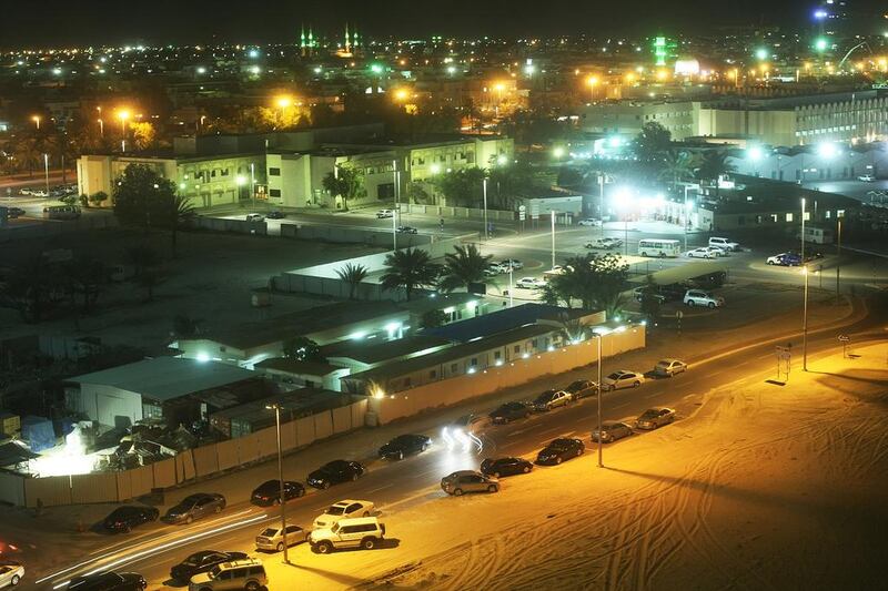 A late-night street scene in the UAE's capital Abu Dhabi. (Delores Johnson / The National)