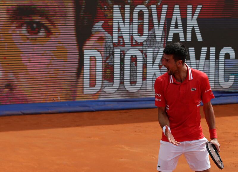 Novak Djokovic celebrates after beating Alex Molcan. EPA