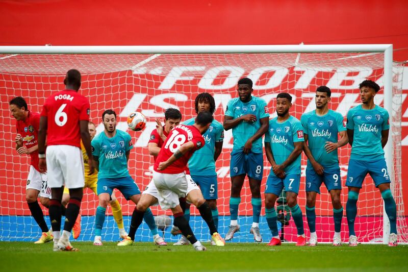Manchester United's Bruno Fernandes scores their fifth goal from a free kick. Reuters