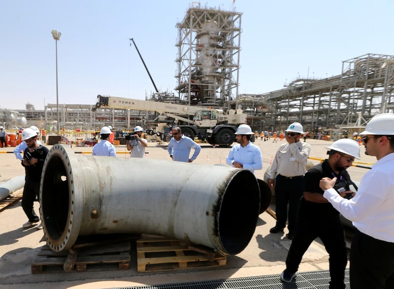A damaged pipeline is seen at Saudi Aramco oil facility in Khurais. Reuters