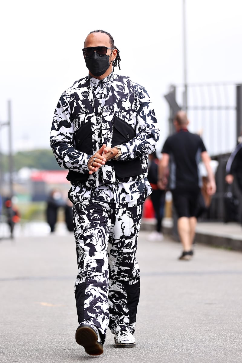 Lewis Hamilton, in a black and white Death to Tennis tracksuit, in the paddock ahead of the Brazilian Grand Prix at Autodromo Jose Carlos Pace on November 11, 2021, in Sao Paulo. Getty Images